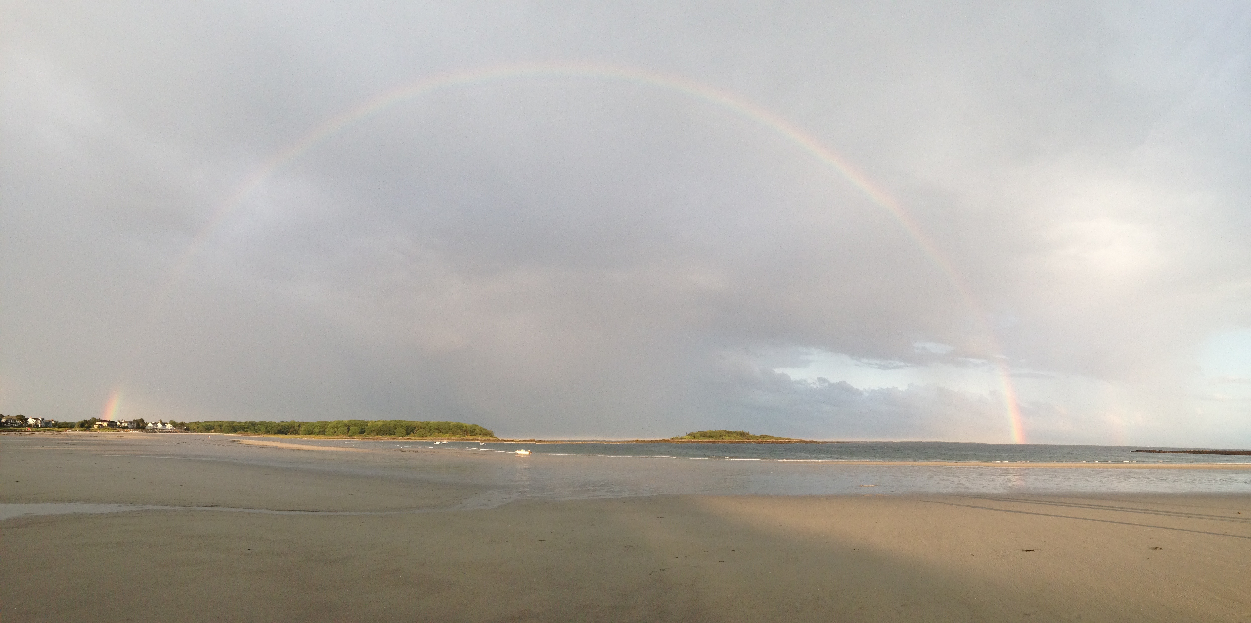 rainbow over beach